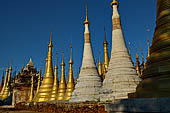 Inle Lake Myanmar. Indein, on the summit of a hill the  Shwe Inn Thein Paya a cluster of hundreds of ancient stupas. Many of them are ruined and overgrown with bushes. 